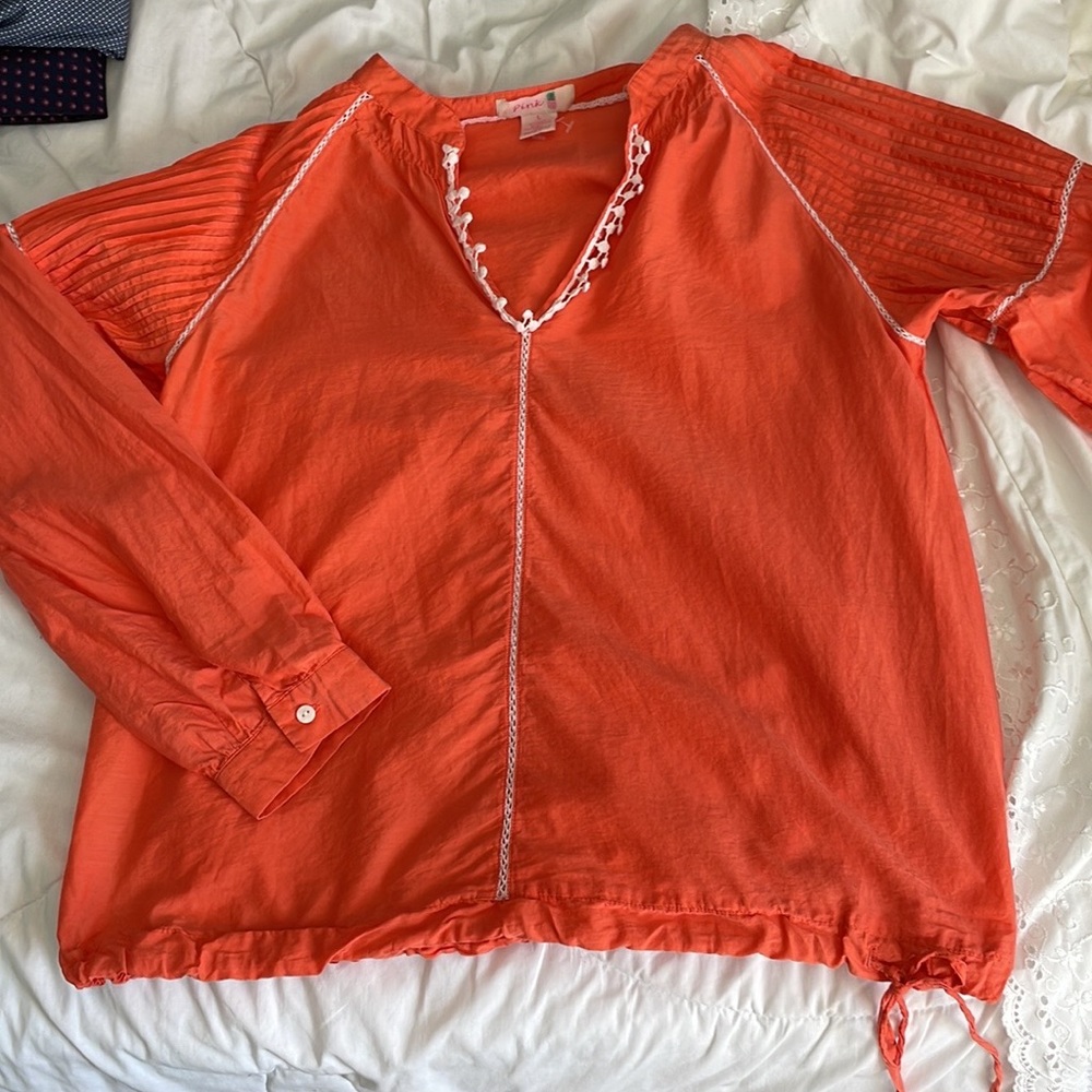Unique orange blouse